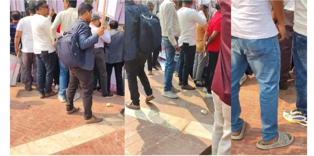 শহীদ মিনারের বেদিতে জুতা পায়ে এরা কারা?